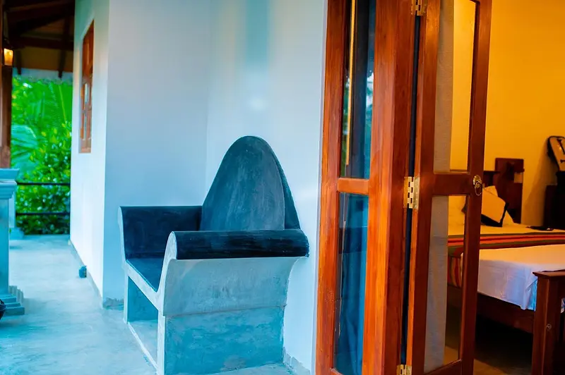 Curved built-in seat on the veranda beside the bedroom door
